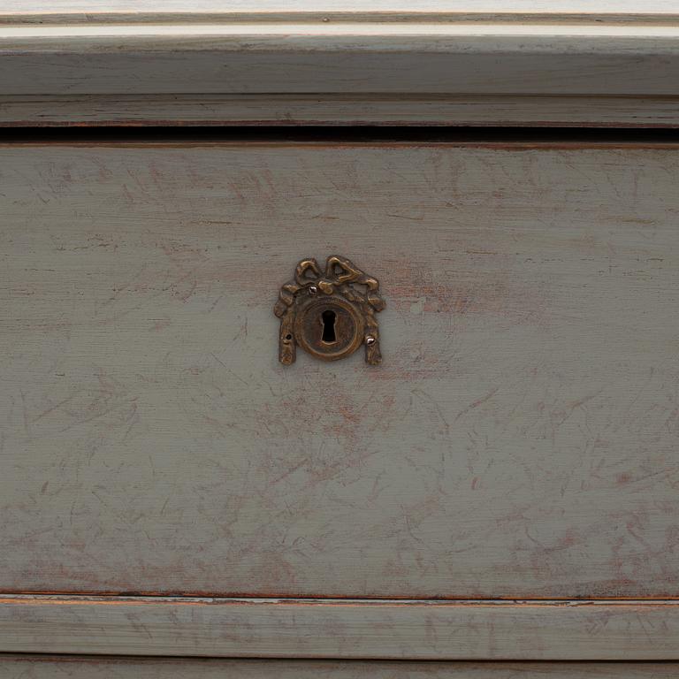 A mid 19th century painted chest of drawers.