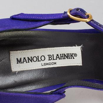 A pair of satin high heels by Manolo Blahnik, size 40.