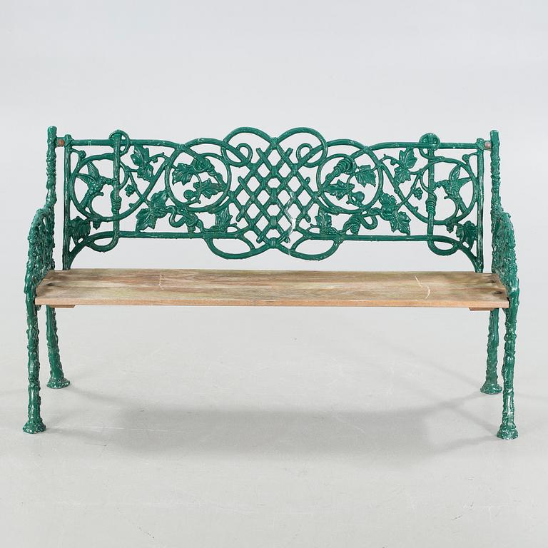 An early 20th century garden sofa.