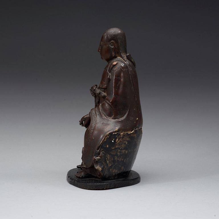 A bronze figure of a daoistic deity, 17th century.