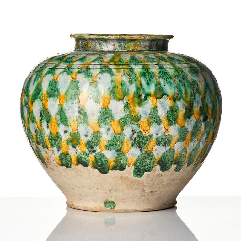 A sancai-glazed pottery jar, Tang dynasty (618-907).
