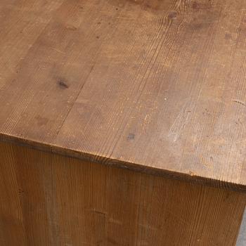 A stained pine writing desk attributed to Carl Westman, early 20th Century.