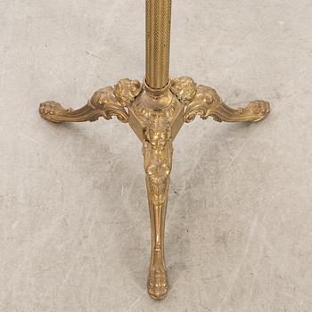 A brass coat hanger alter part of the 20th century.