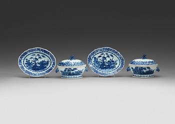 426. A pair of blue and white butter tureens with covers and stands, Qing dynasty, Qianlong (1736-95).