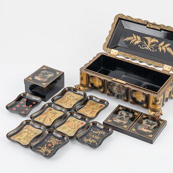 A Chinese lacquered gaming set, late Qing dynasty.