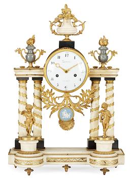 541. A Louis XVI late 18th Century mantel clock.