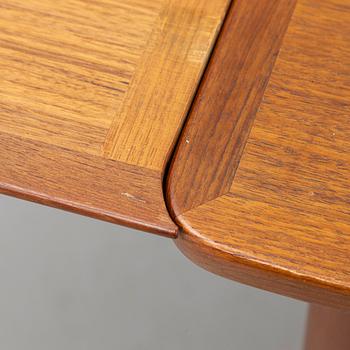 A teak-veneered dining table, 1960's/70's.