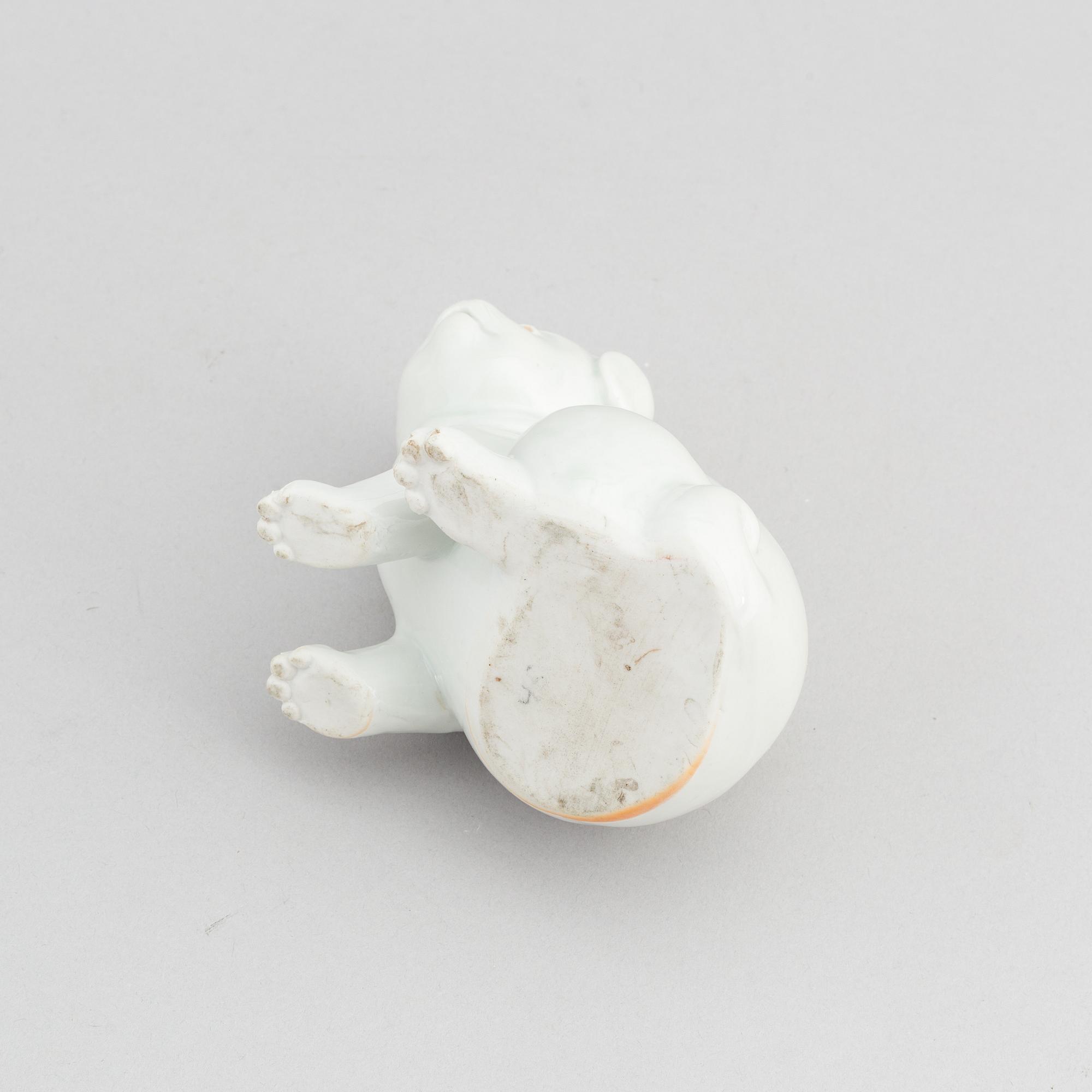 A Japanese Hirado ware figure or water dropper in the shape of a dog, 20th Century or older.