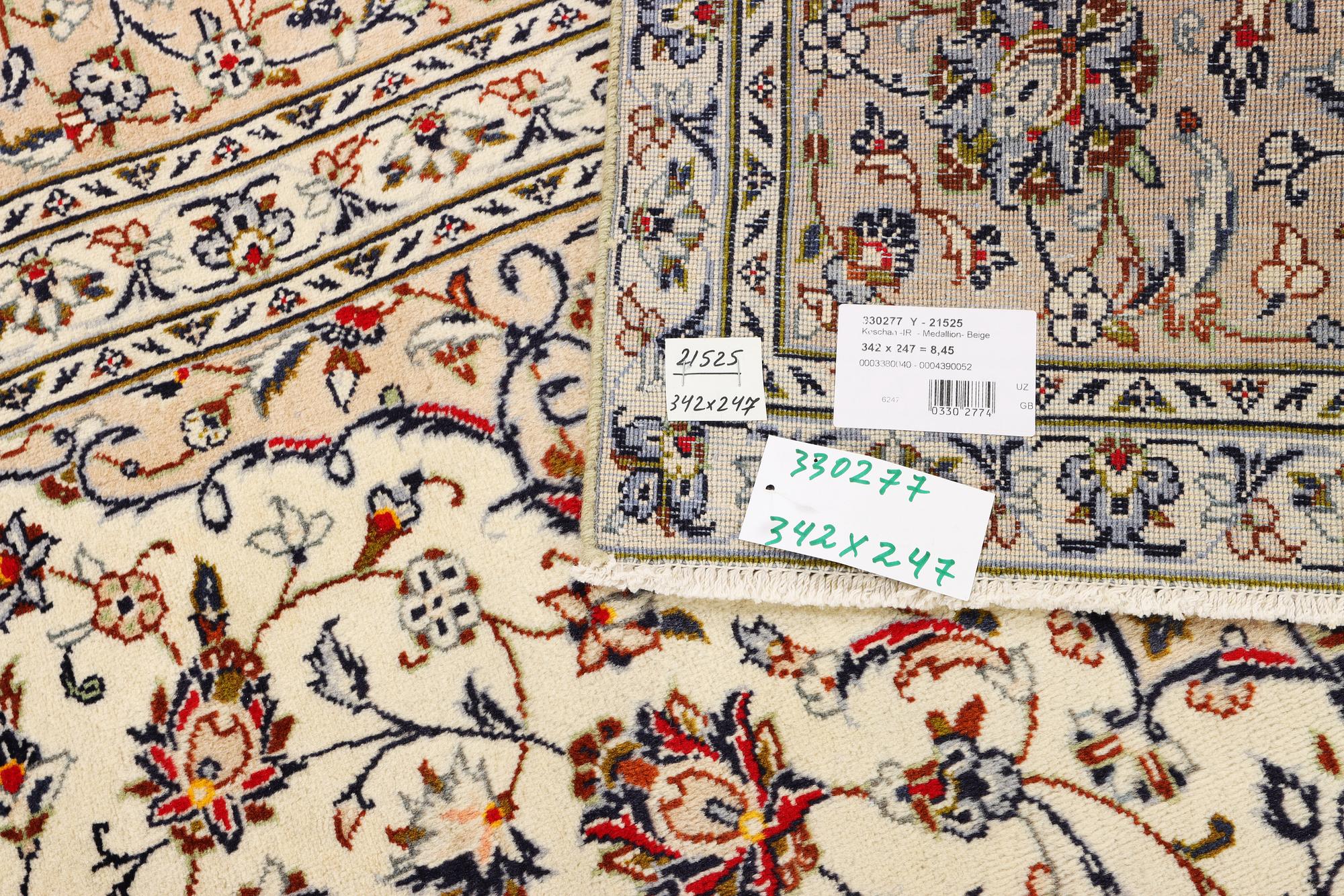 A Keshan carpet, c. 342 x 247 cm.