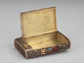 A CIGARRETTE Russian 19th century parcel gilt and enameld cigarette-case, makers mark of Michael Isakov, S.t Petersburg.