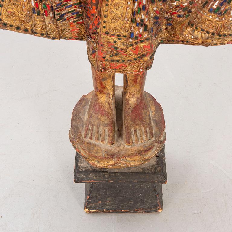 A gilde wooden Buddha first half of the 20th century.