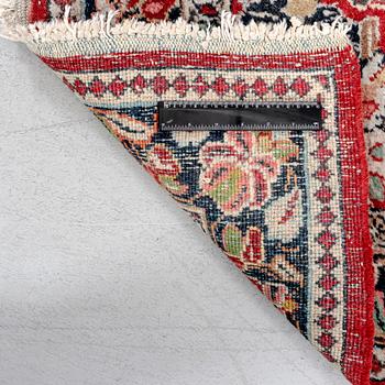 A semaitnique Sarouk carpet ca 204x128 cm.
