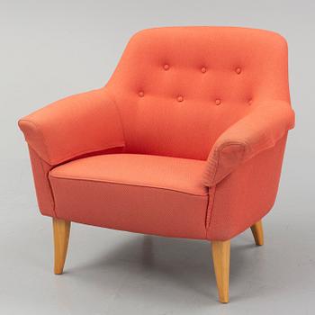 A late 20th century easy chair.