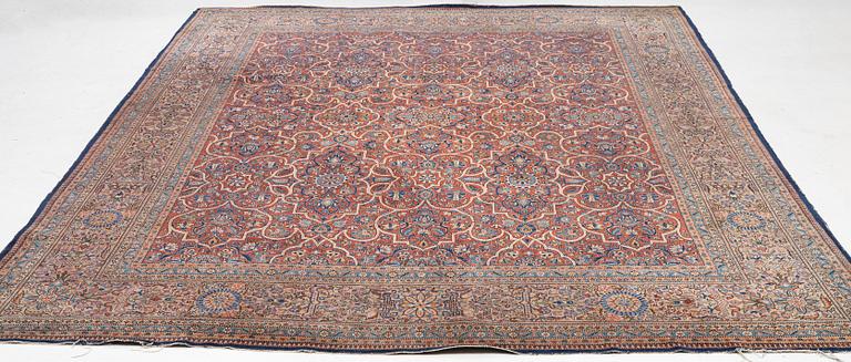 An oriental carpet, c. 425 x 305 cm.