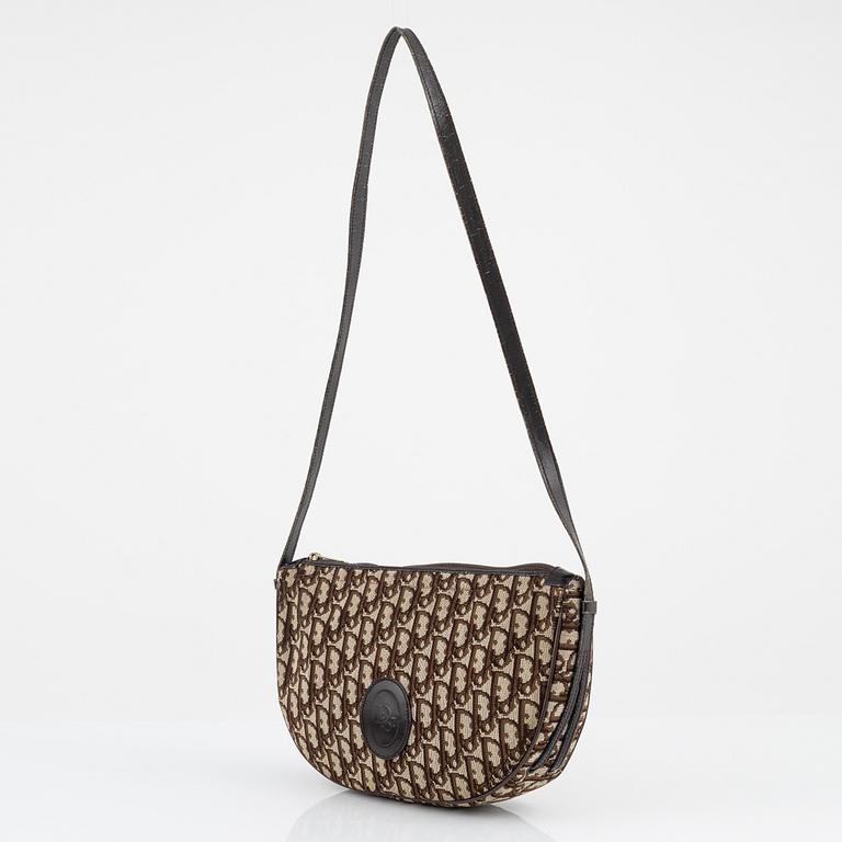 Christian Dior, A vintage bag and umbrella.