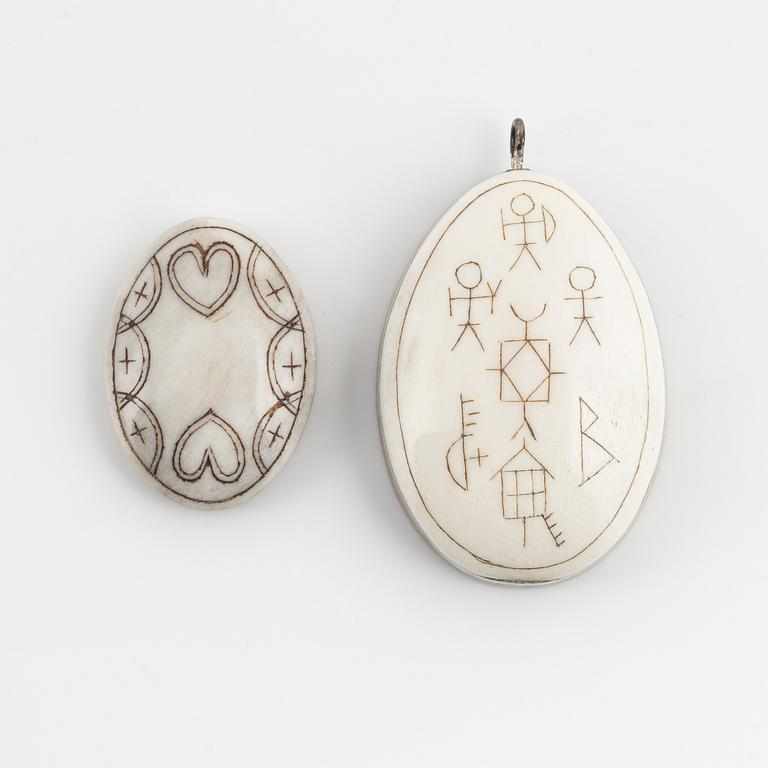 Two birch and reindeer pendants by Bertil Fällman, one signed.