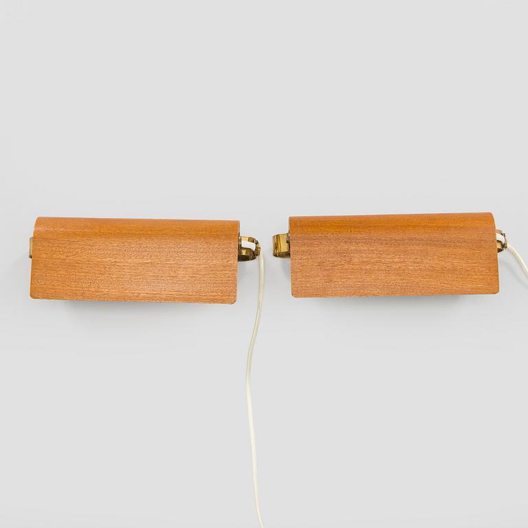 A pair of mid-20th century model 2317 wall lights by Valinte.