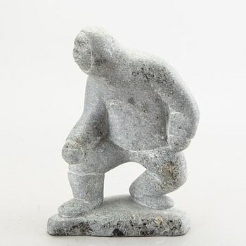 A simon Kristofferson signed stone figurine.