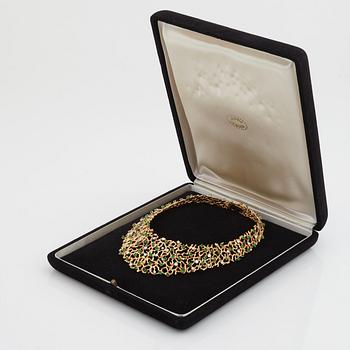 A emerald and brilliant cut diamond necklace by Gilbert Albert, Geneve, Zürich.