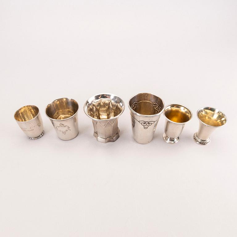 Six 20th century, miniature beakers, silver, makers of Georg Jensen, Lachmann and others.