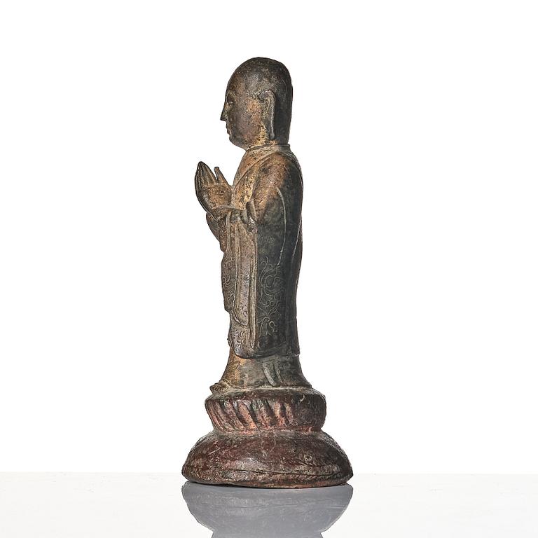 A bronze sculpture of Ananda, Ming dynasty (1368-1644).