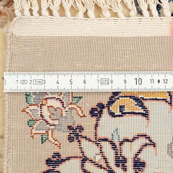 A part silk Isfahan rug, signed, c. 125 x 84 cm.