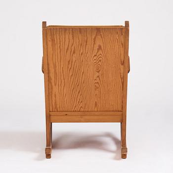 Nordiska Kompaniet, a Swedish Modern stained pine 'Lovö' rocking chair.