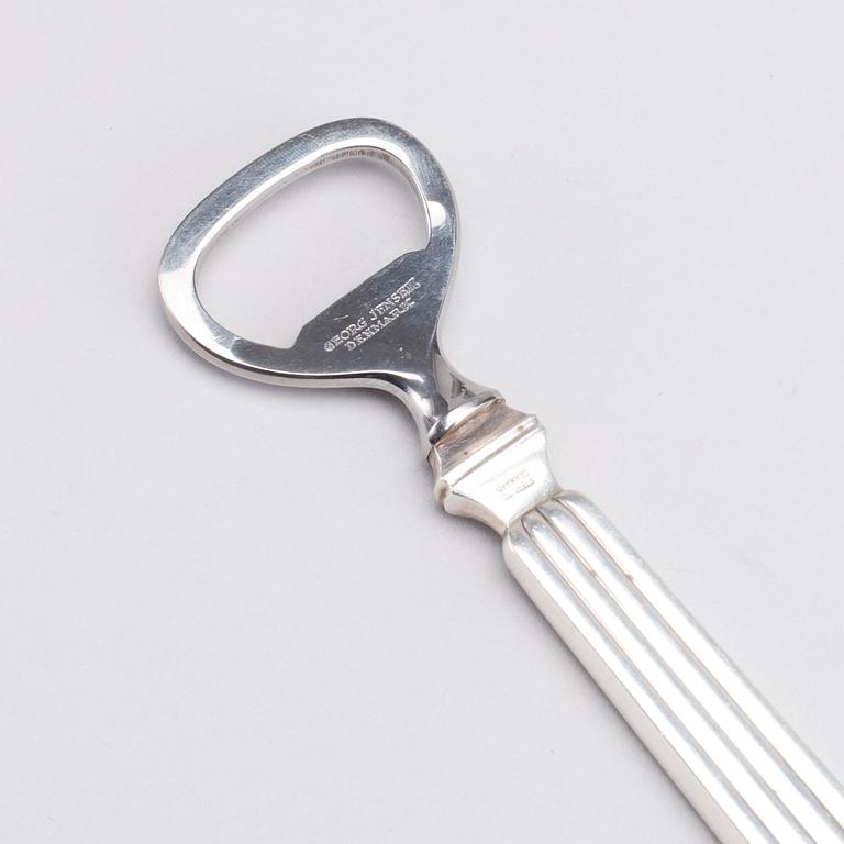 A Danish 20th century set of sterling silver bowl and opener, mark of S Bernadotte and G Jensen, weight ca 315 gr.