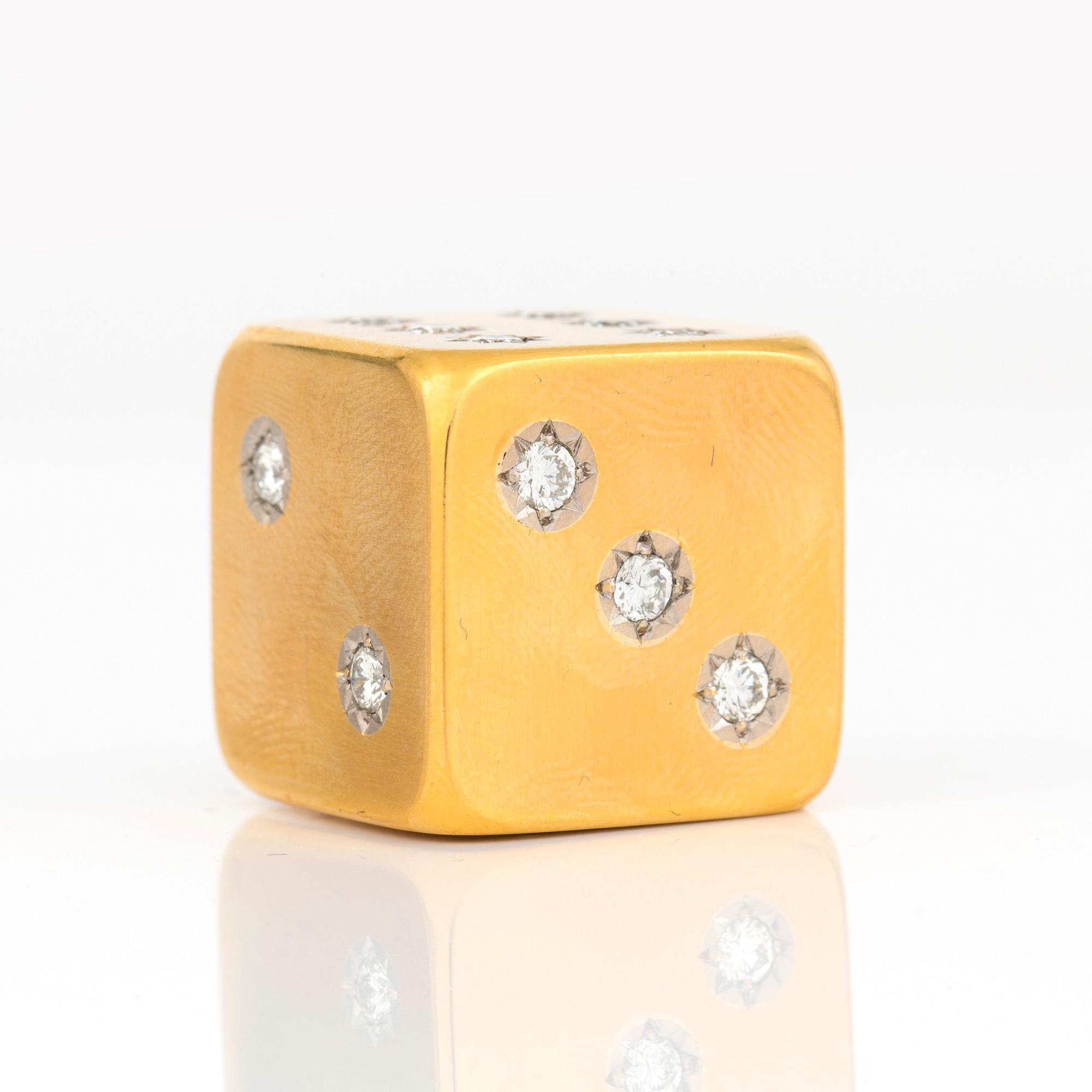 TÄRNING med briljantslipade diamanter, 23K guld.