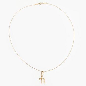 Tiffany & Co, Elsa Peretti, an 18K gold 'Alphabet Pendant' necklace.