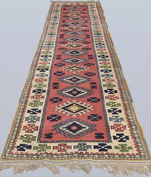 A semi-antique Kars runner, approx. 431 x 95 cm.