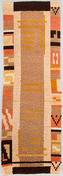 A 1930's Finnish long pile rug. Ca 140x47 cm.