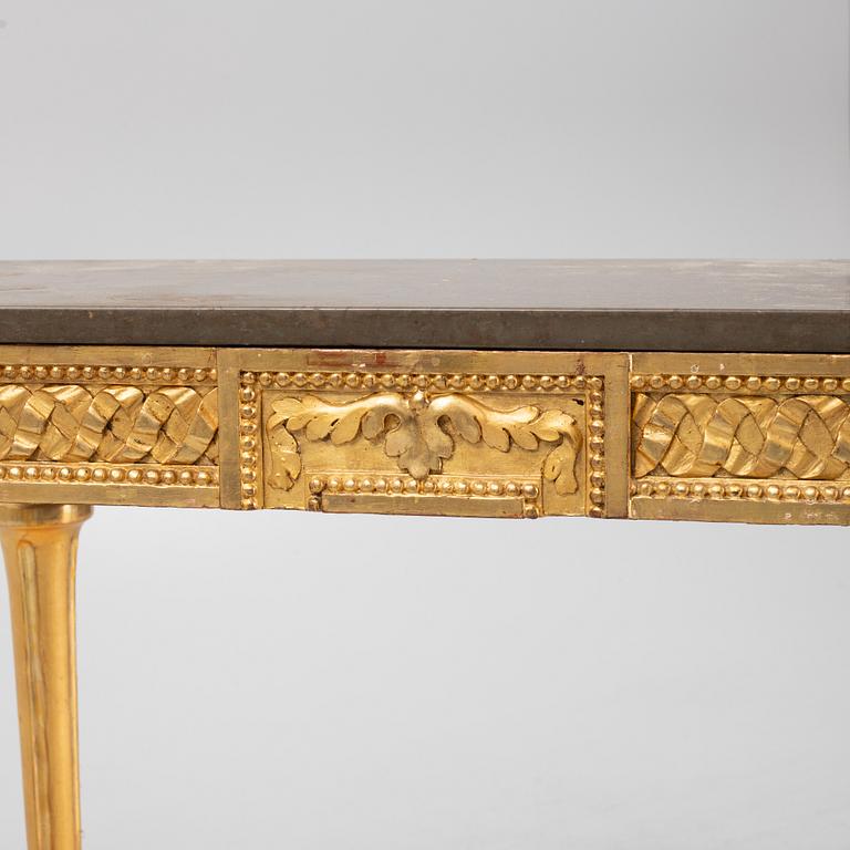 A console table with stone top.