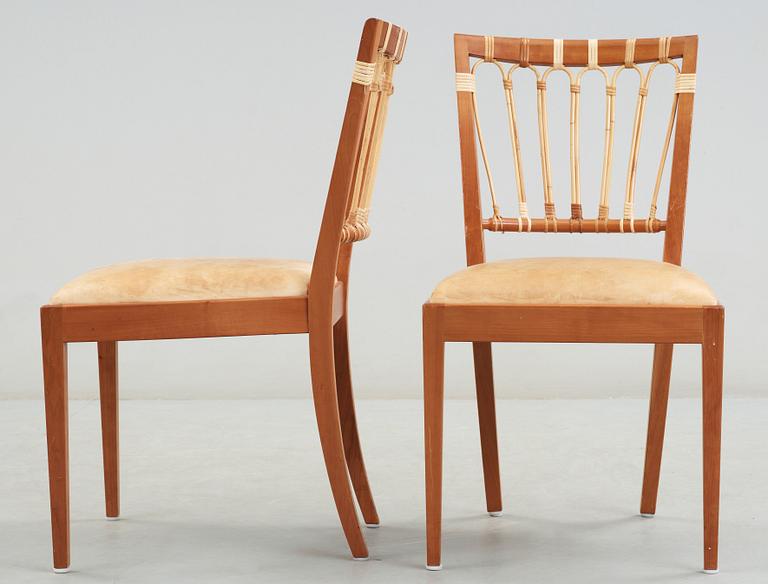 A set of four Josef Frank mahogany and ratten dining chairs, Svenskt Tenn, model 1165.