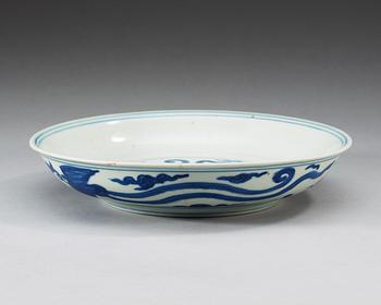 A blue and white Phoenix dish, Ming dynasty with Jiajings six character mark and period (1522-66).