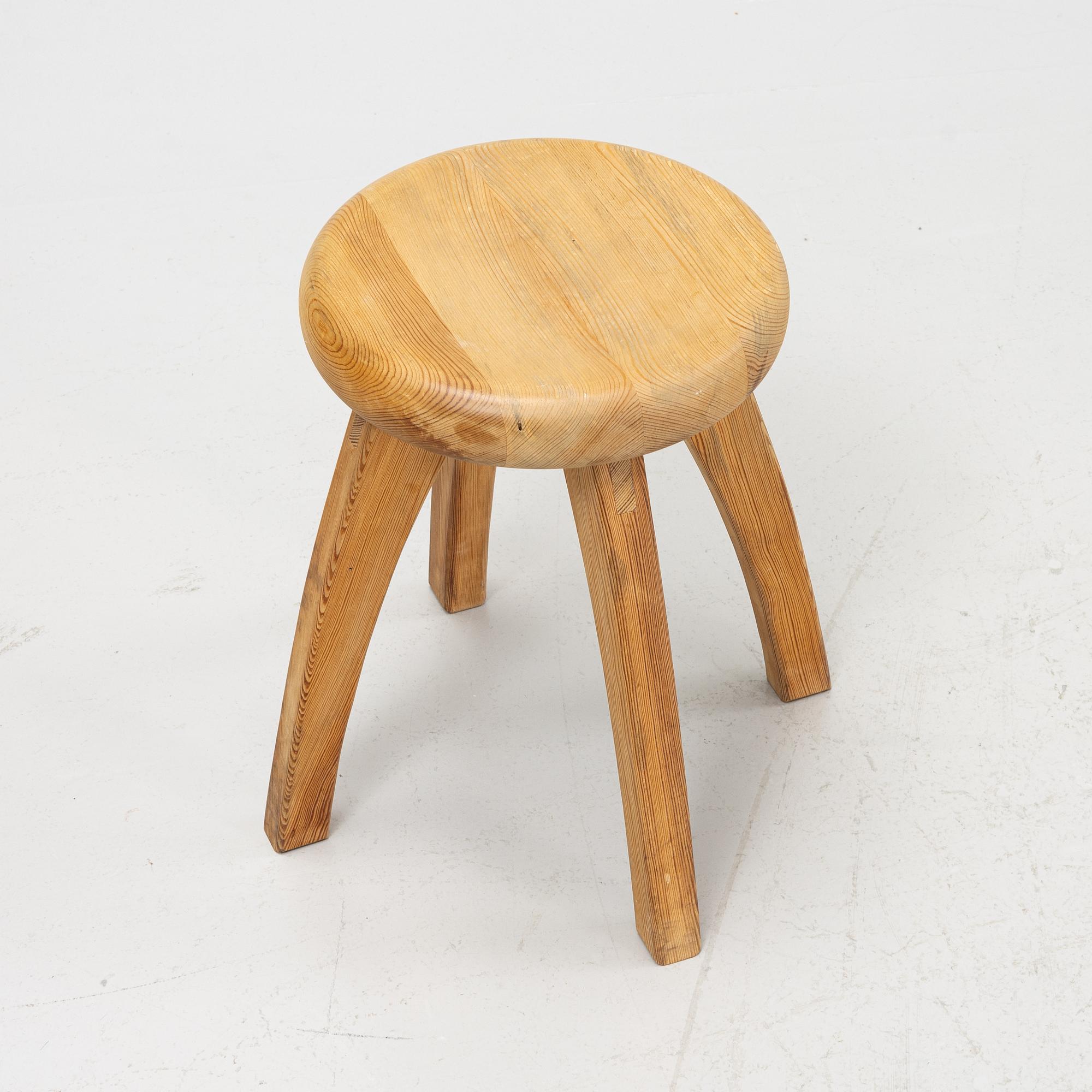 A pine stool, second half of the 20th Century.