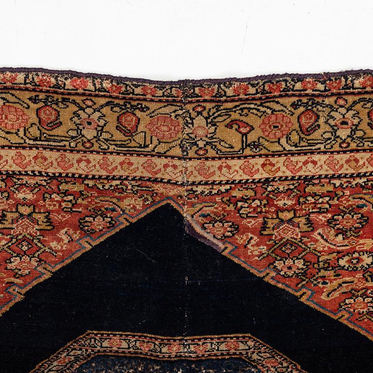 A Senneh saddle cover, North West Persia, ca 80 ,5 x 92,5  cm.