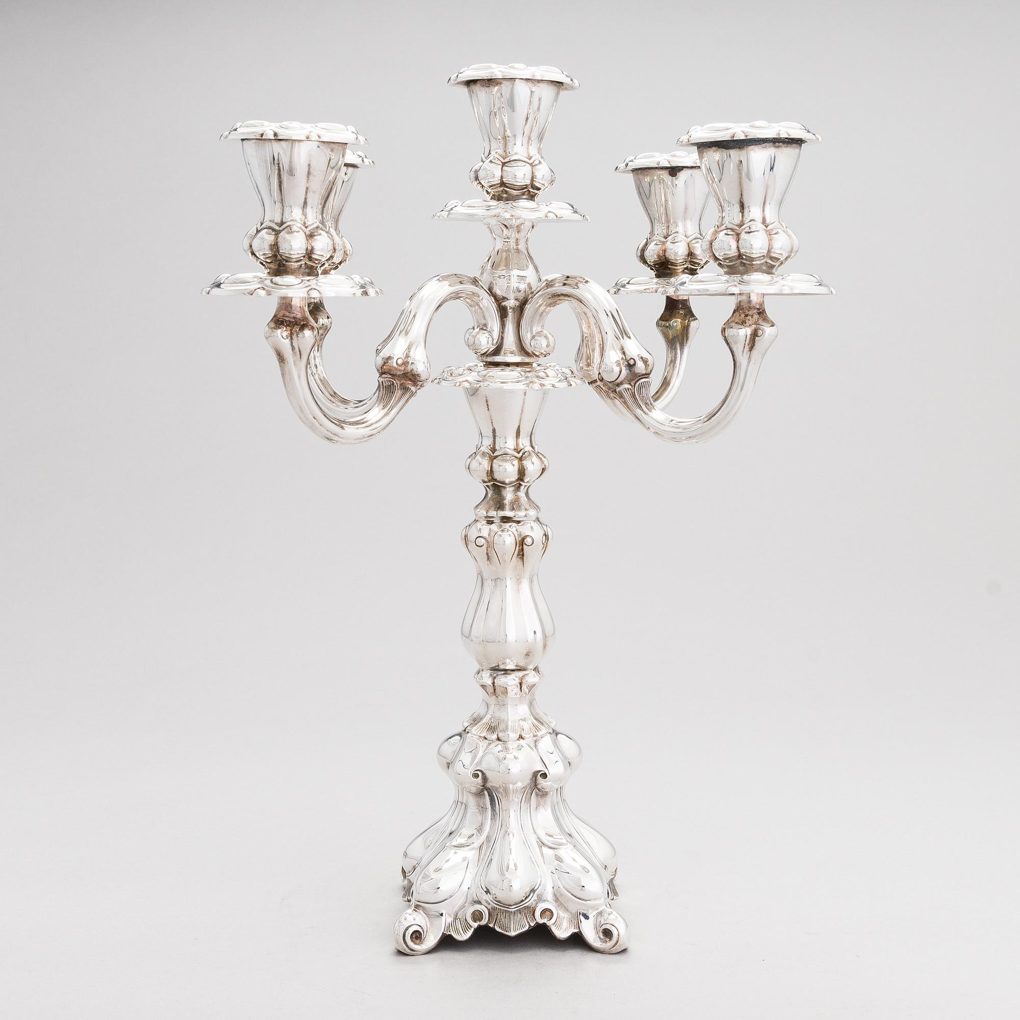 Kynttelikkö, hopeaa, Kultakeskus, Hämeenlinna 1987-88.