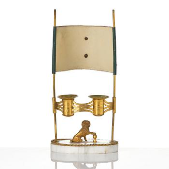 A late Gustavian gilt brass, marble and tole reading lamp, late 18th century.