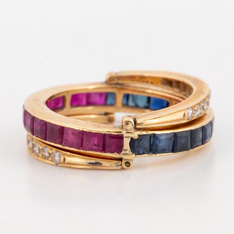 Calibre-cut ruby and sapphire and brillint-cut diamond ring.