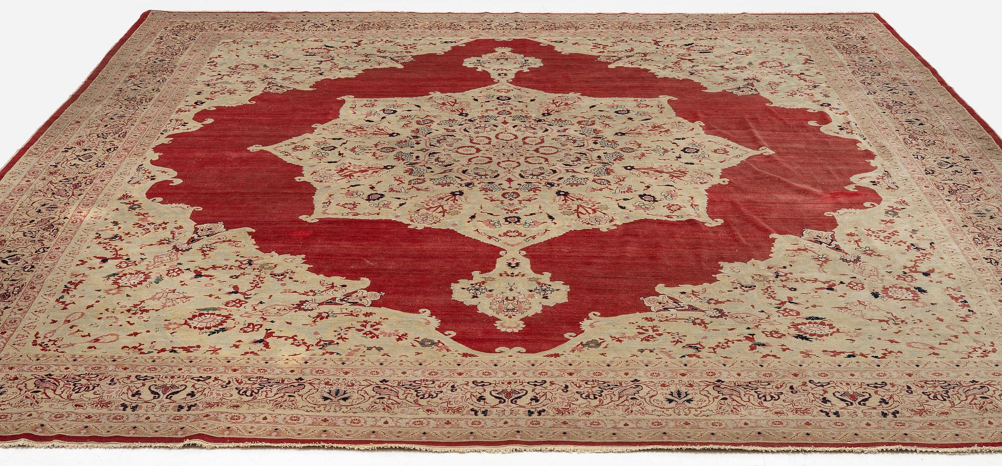 An antique 'Haj Jalili' Tabriz carpet, Northwest Persia, c. 435 x 395 cm.