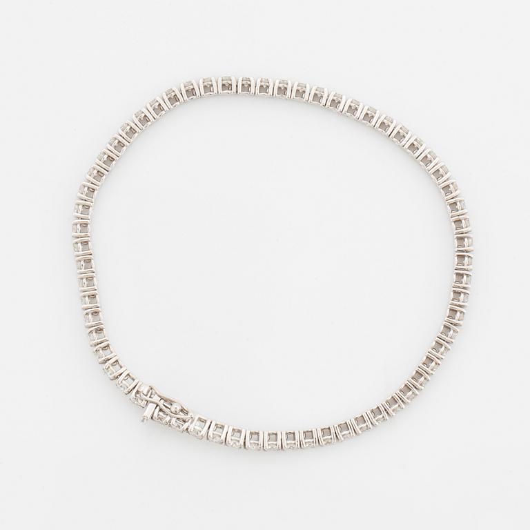 TENNISARMBAND, med briljantslipade diamanter med certifikat HRD.