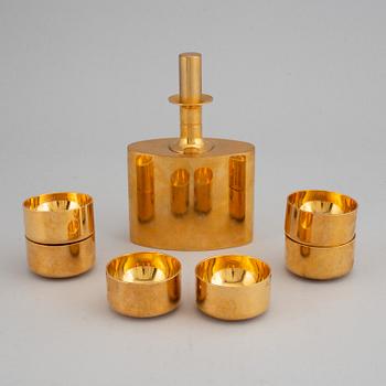 PIERRE FORSSELL, a gilt brass flask and six cups, Skultuna.