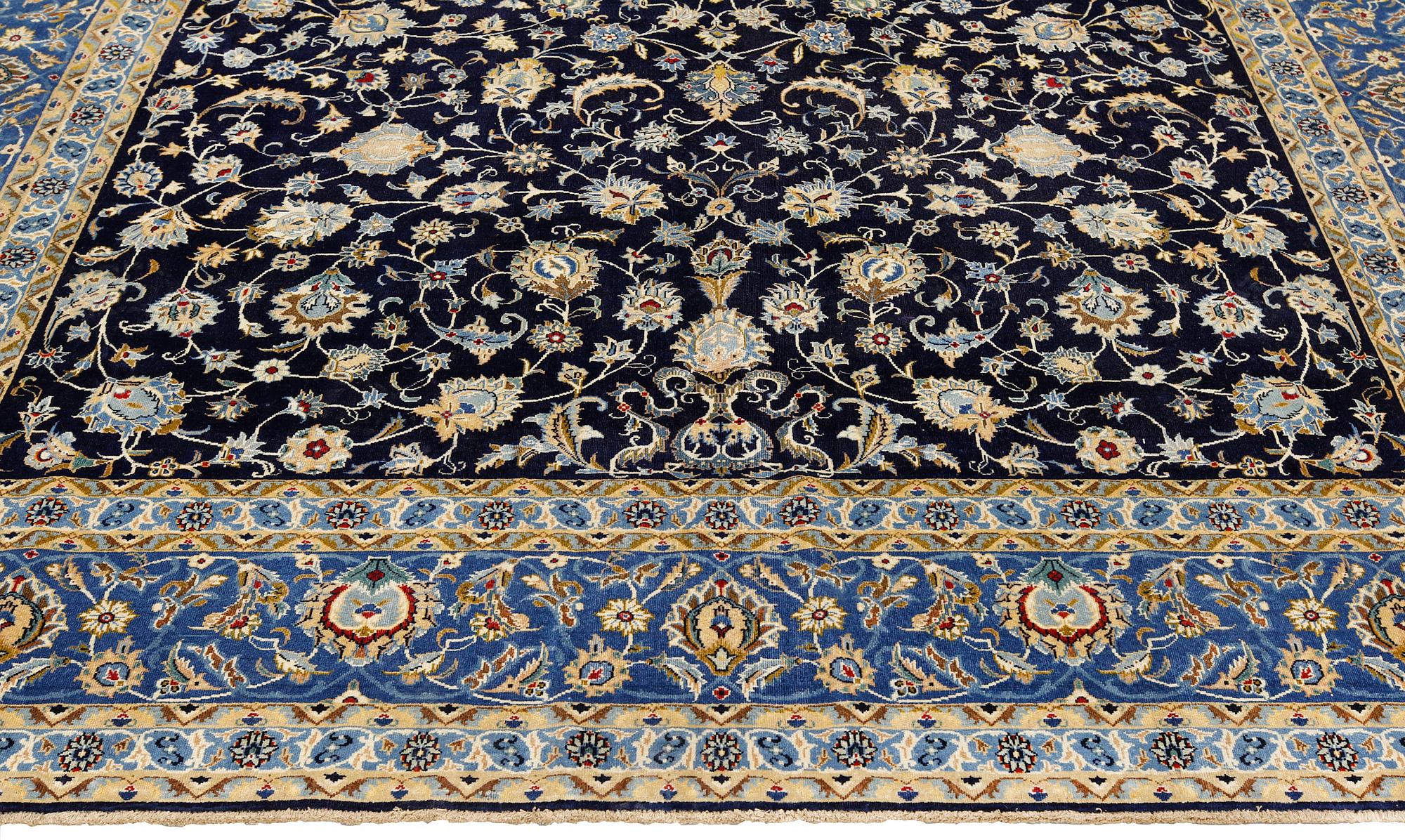 A Kashan carpet of 'Shah Abbas' design, c 376 x 276 cm.