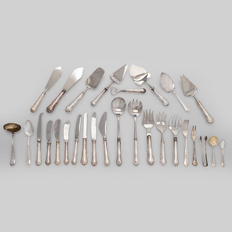 An 56-piece set of 'Chippendale' silver cutlery, Finnish hallmarks.