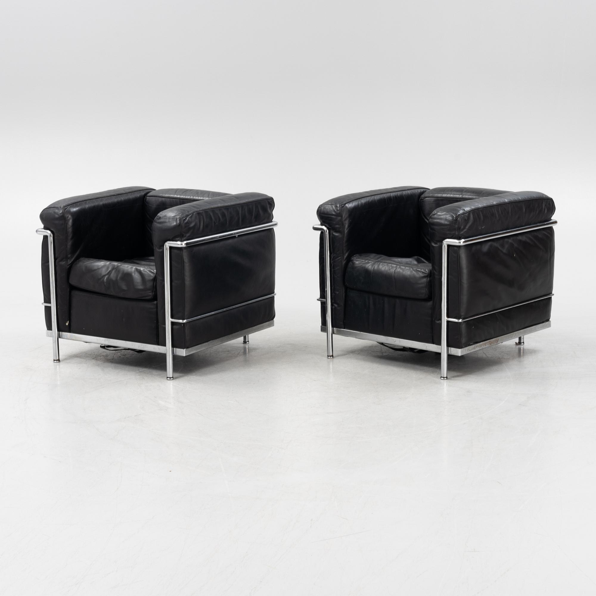 Le Corbusier, Pierre Jeanneret & Charlotte Perriand, a pair of 'LC2' easy chairs, Cassina.