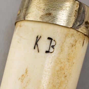 Four Sami reindeer horn items, signed.