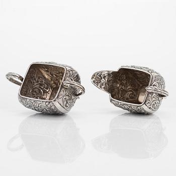 A 1940s Dutch silver sugar bowl and cream jug on a tray, Amsterdam, 1947 and 1942.