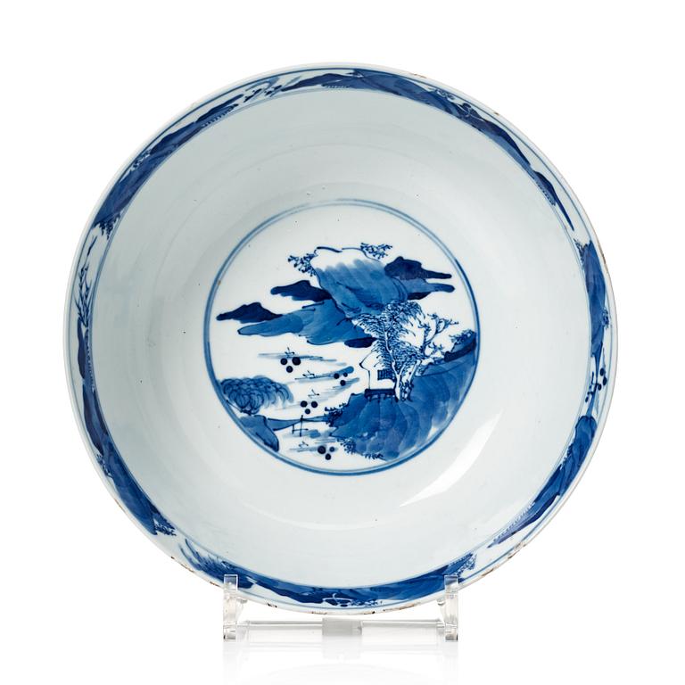 A blue and white bowl, Qing dynasty, 19th Century with Kangxi mark.