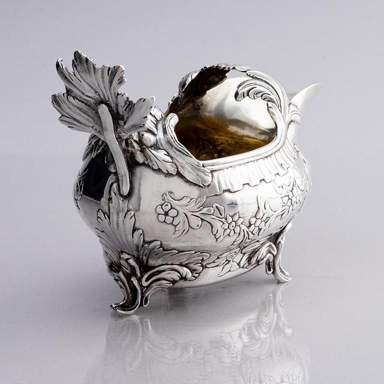 A Swedish Rococo 18th century parcel-gilt silver cream-jug, mark of Johan Abbelin, Gothenburg 1774.